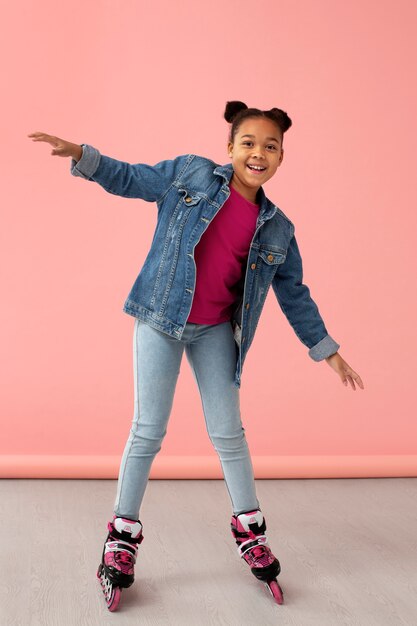 Portrait of young girl with roller blades