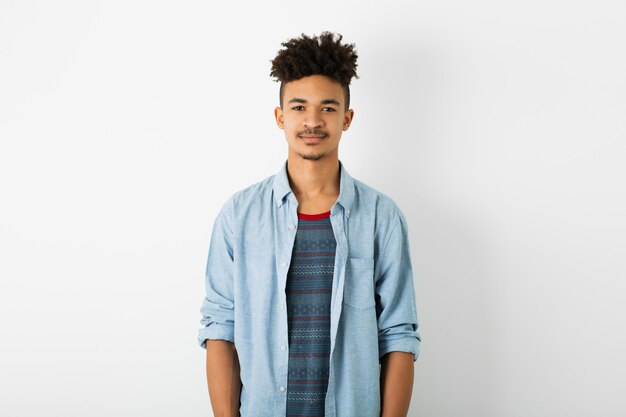 Portrait of young handsome black man on white