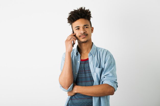 Portrait of young handsome black man on white