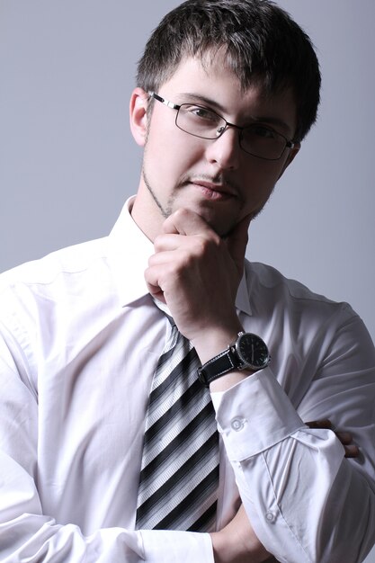 Portrait of young handsome businessman