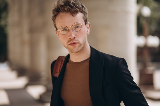 Portrait of young handsome man in spectacles