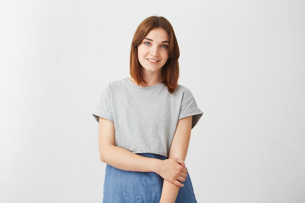 Portrait of young happy cheerful beautiful girl smiling .