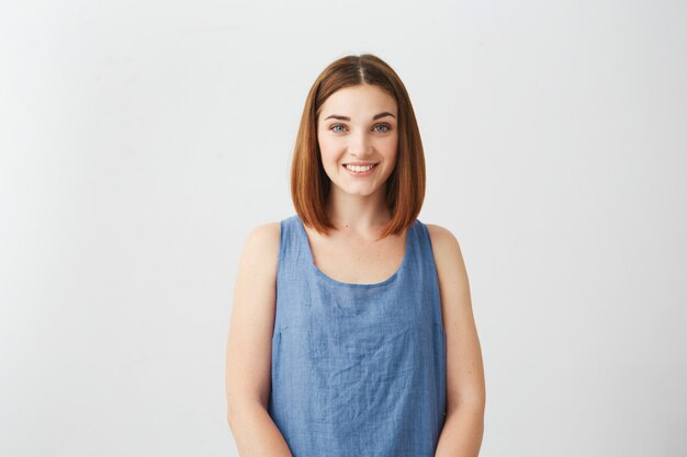 Portrait of young happy cheerful beautiful girl smiling .