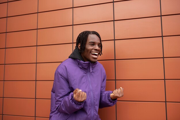 Portrait of young and happy man