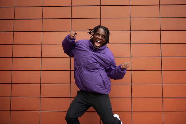 Portrait of young and happy man