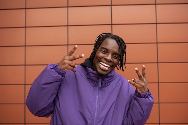 Portrait of young and happy man