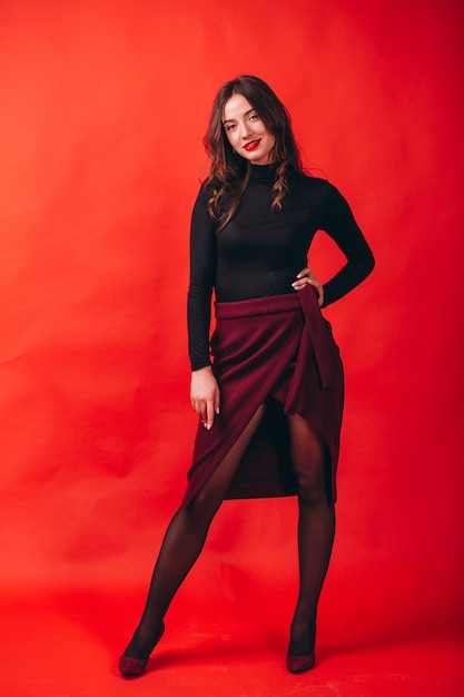 Portrait of young happy woman in studio