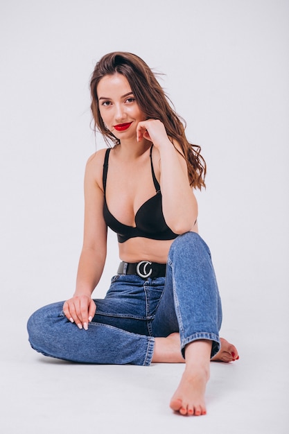 Portrait of young happy woman in studio