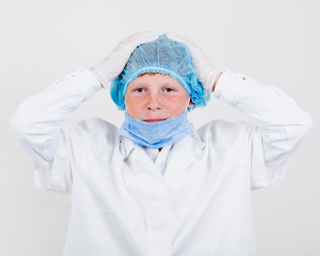 Portrait of young kid with hair net