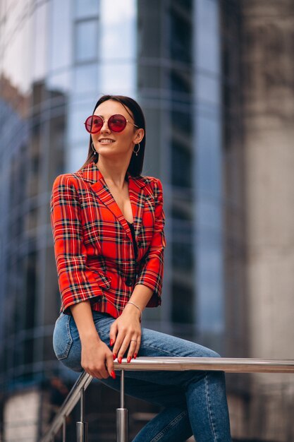 Portrait of a young lady in red jacket