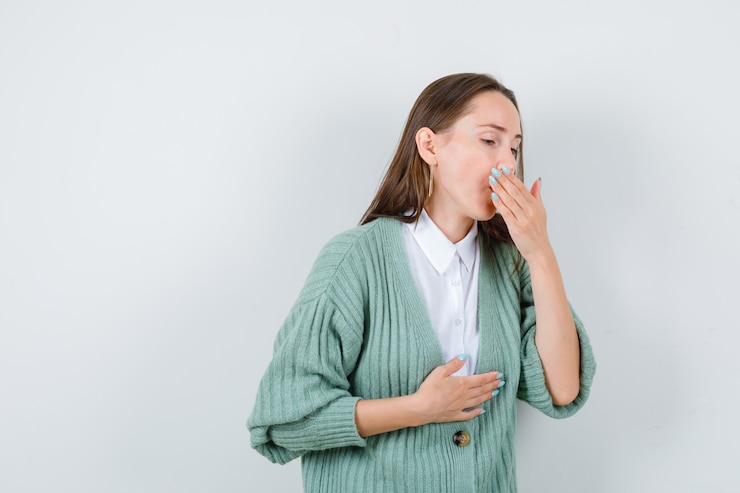 Free Photo portrait of young lady suffering from cough in shirt, cardigan and looking sick front view