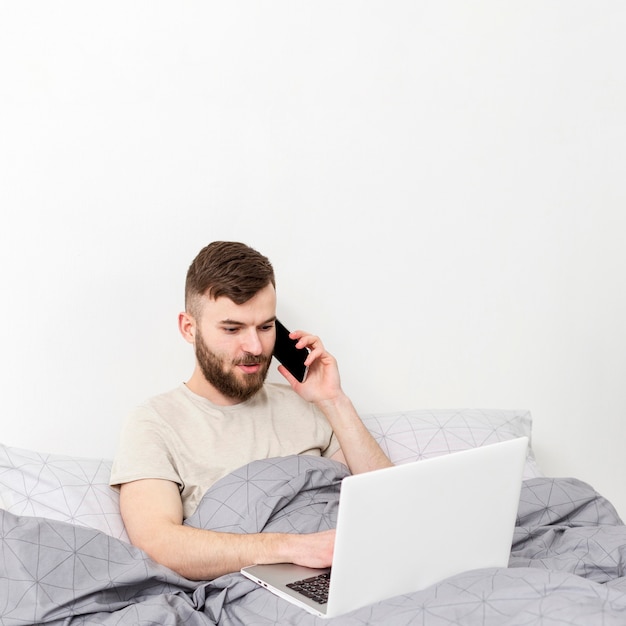 Portrait of young male happy to work from home