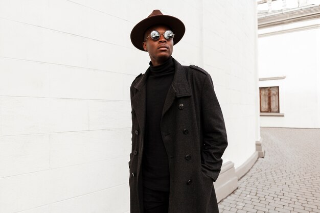 Portrait of young male with hat and sunglasses