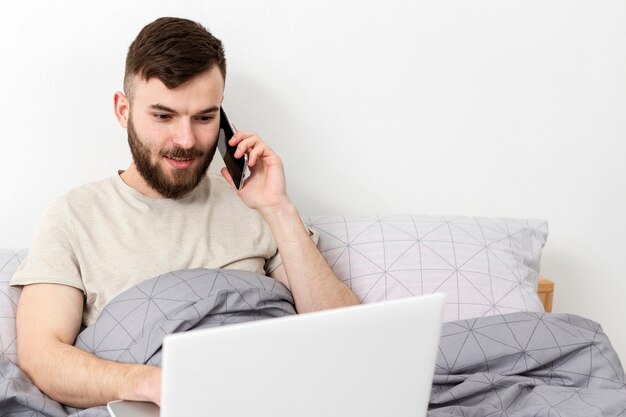 Portrait of young man enjoying remote work