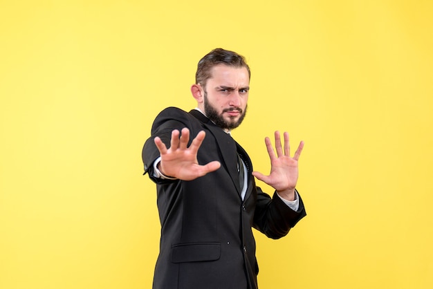 Portrait of young man hands open in questionng expression