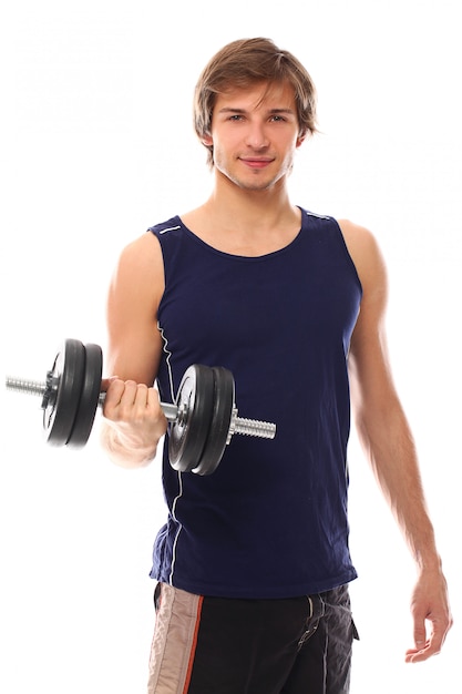portrait young man holding a dumbbell