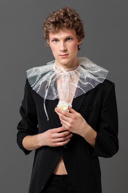 Portrait young man wearing make up and stylish clothes