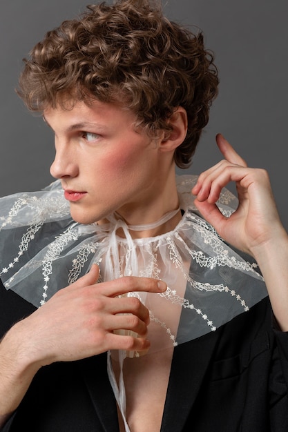 Portrait young man wearing make up and stylish clothes