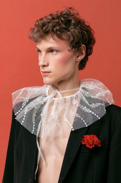 Portrait young man wearing make up and stylish clothes