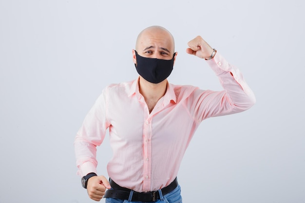 Portrait of young man wearing a protective mask