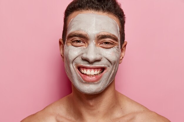 Portrait of young man with face mask