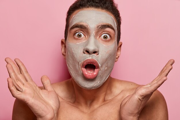 Portrait of young man with face mask