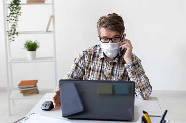 Portrait of young man working from home