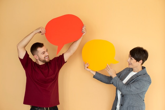 Portrait of young people with thought bubble