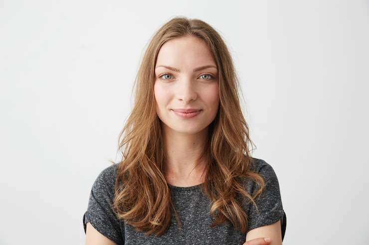 Free Photo portrait of young pretty positive girl smiling .