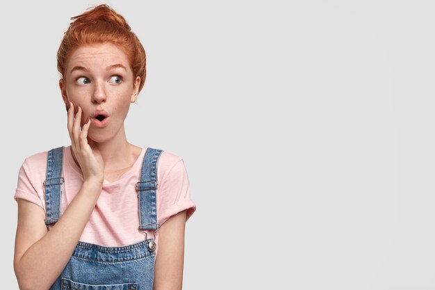 Portrait of young red-haired woman