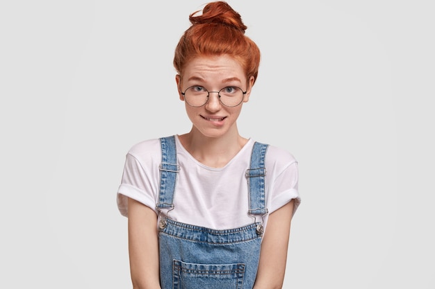 Portrait of young red-haired woman