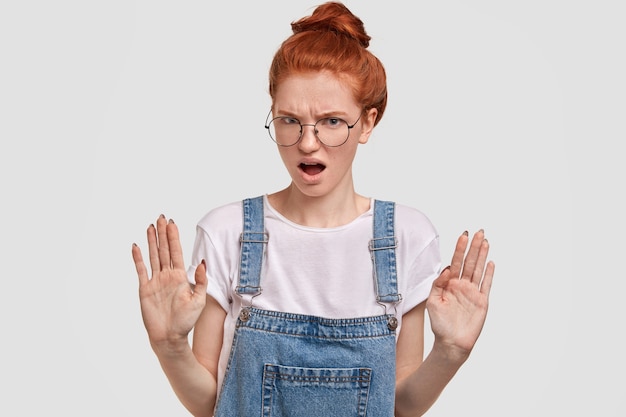 Portrait of young red-haired woman