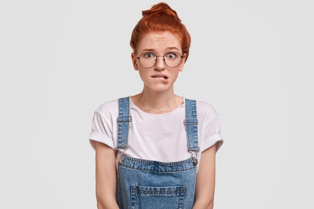 Portrait of young red-haired woman