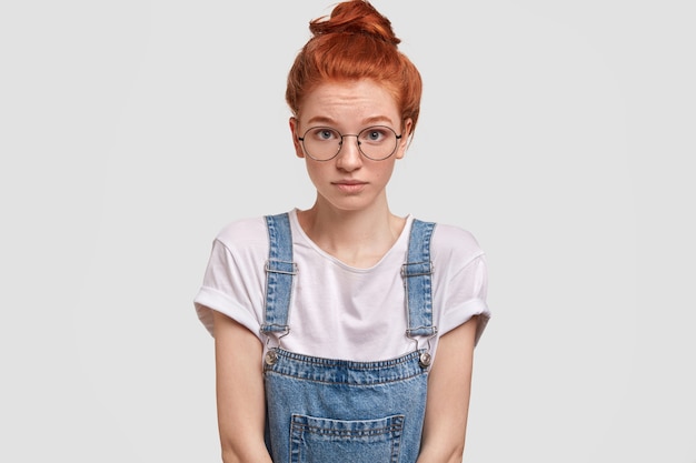 Portrait of young red-haired woman