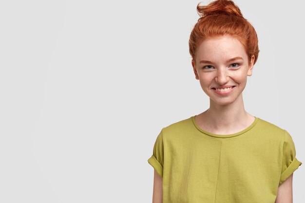 Portrait of young red-haired woman