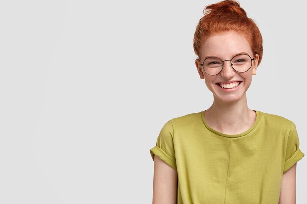 Portrait of young red-haired woman