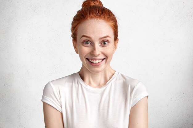 Portrait of young red-haired woman