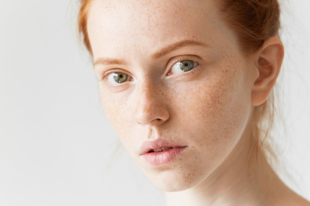 Portrait of young red-haired woman