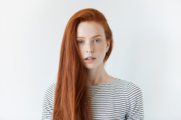 Portrait of young red-haired woman