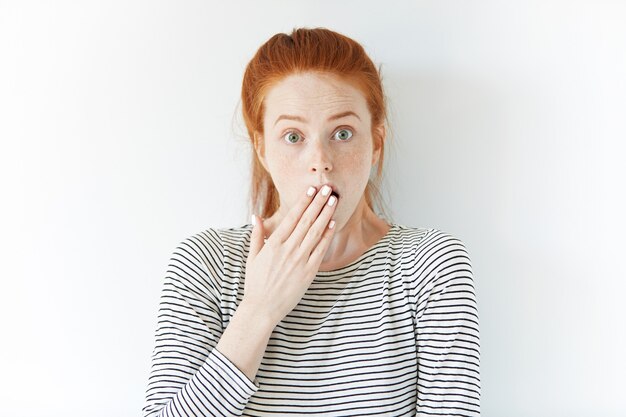 Portrait of young red-haired woman