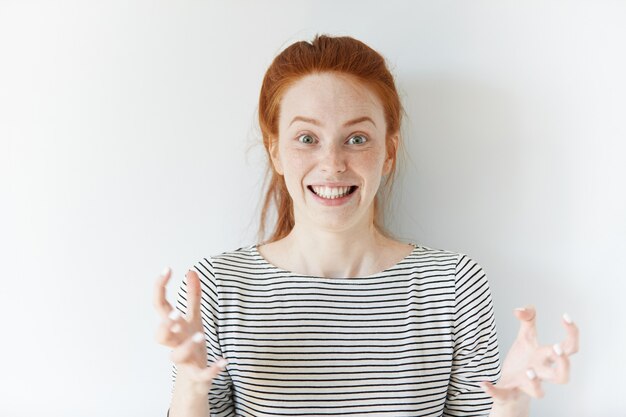 Portrait of young red-haired woman