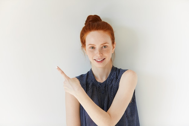 Portrait of young red-haired woman