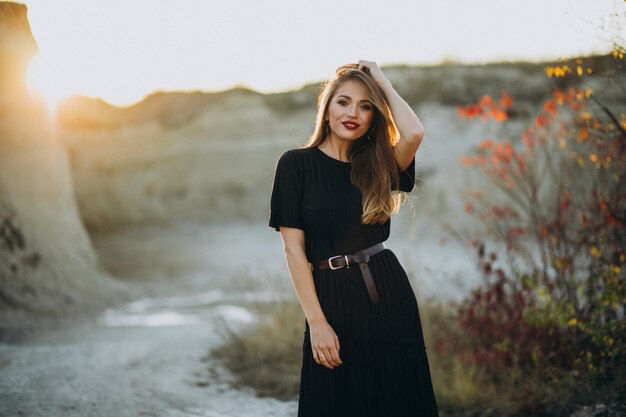 Portrait of a young sensual woman on a sunset