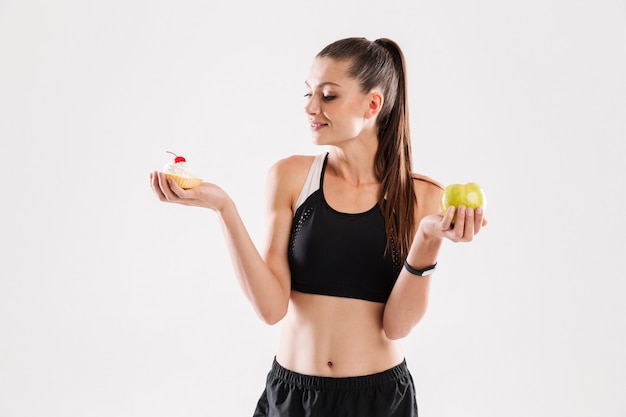 Portrait of a young slim sportswoman