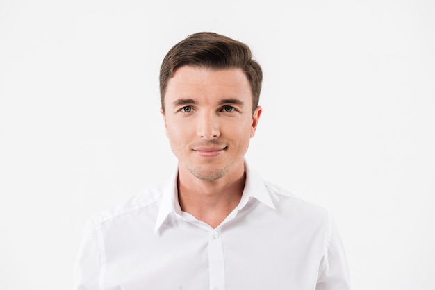 Free photo portrait of a young smiling man