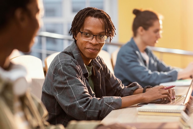 Portrait of young student in class