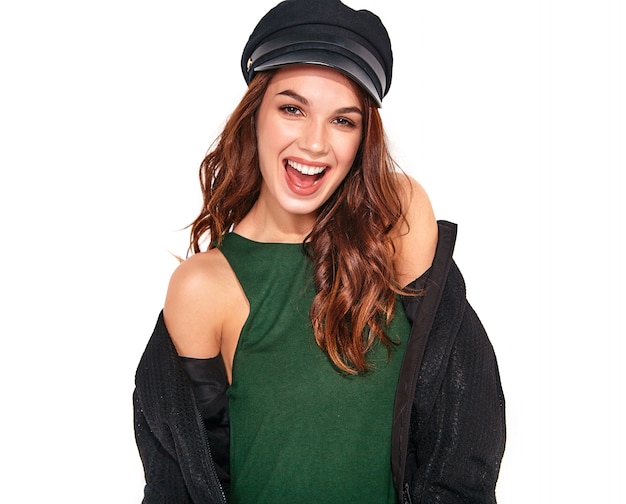 Portrait of young stylish laughing model in black casual summer clothes in cap with natural makeup on white