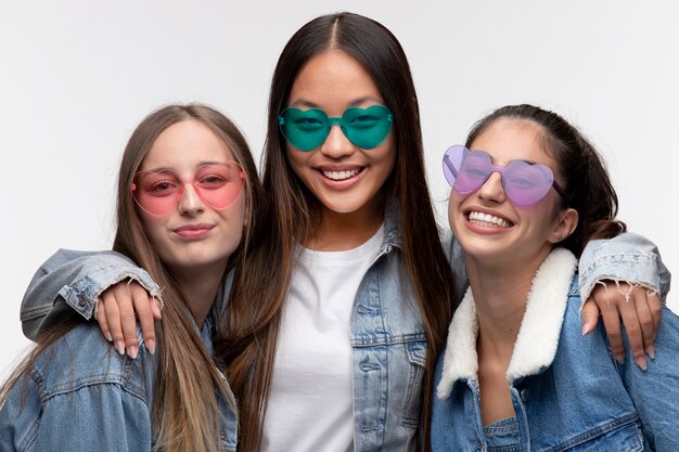 Portrait of young teenage girls posing together