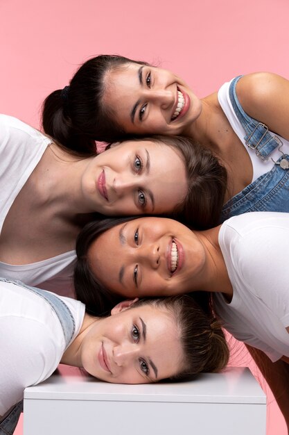 Portrait of young teenage girls posing together