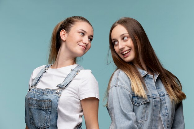 Portrait of young teenage girls posing together
